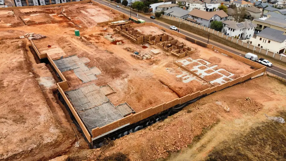 Oblique aerial overview of Phase 1 construction and site access at iQ Bronberg