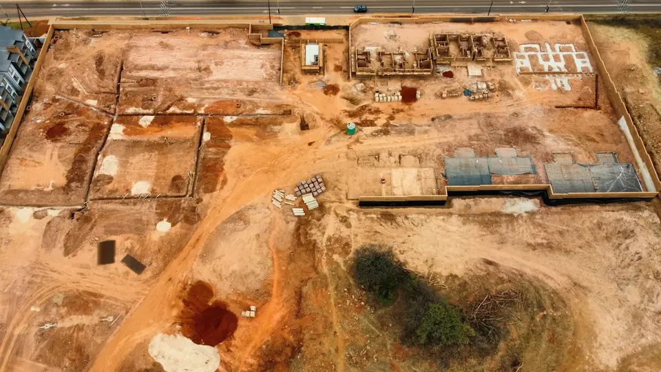 High aerial view showing current construction activity across the iQ Bronberg site