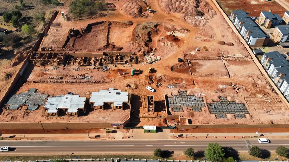 Top-down aerial view of Phase 1 construction from Ajax Avenue